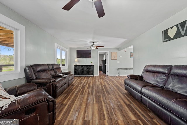 532 Henry Higgins Rd, Jackson, GA 30233 - living room with ceiling fan, dark wood-type flooring, and baseboards