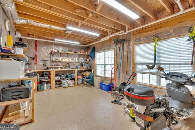basement with a workshop area