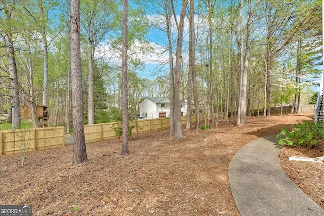 view of yard with fence