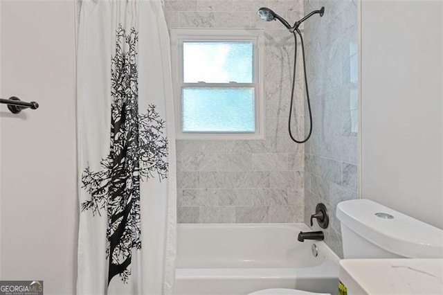 full bath with toilet and shower / bath combo with shower curtain