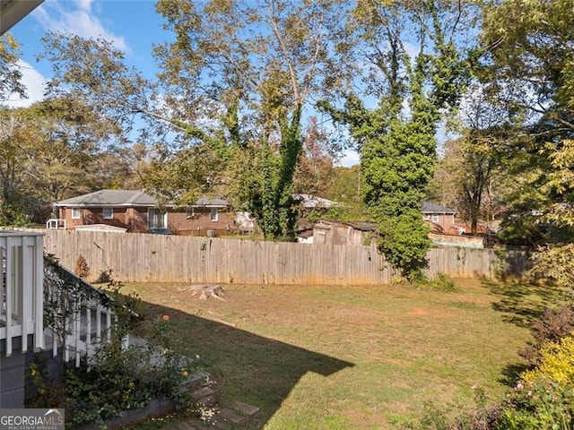 view of yard featuring fence