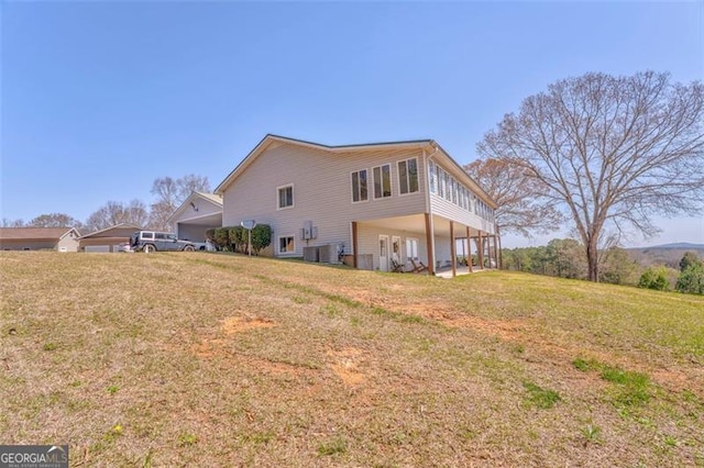 300 Ellis Rd, Rome, GA 30161 - rear view of property featuring a yard