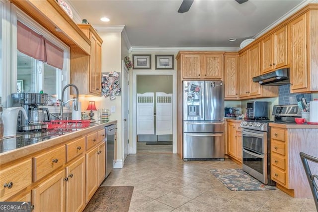 300 Ellis Rd, Rome, GA 30161 - kitchen featuring crown molding, a sink, a ceiling fan, under cabinet range hood, and stainless steel appliances