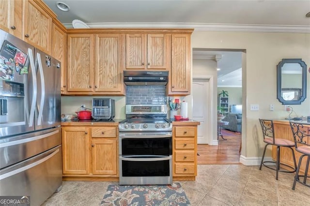 300 Ellis Rd, Rome, GA 30161 - kitchen featuring baseboards, ornamental molding, appliances with stainless steel finishes, under cabinet range hood, and light tile patterned floors