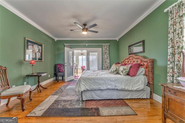 300 Ellis Rd, Rome, GA 30161 - bedroom featuring crown molding, baseboards, and wood finished floors