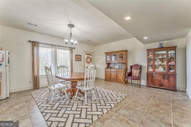 300 Ellis Rd, Rome, GA 30161 - dining room featuring light tile patterned floors, baseboards, visible vents, and a notable chandelier