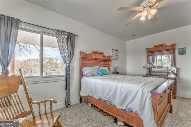 300 Ellis Rd, Rome, GA 30161 - bedroom with baseboards, light colored carpet, and ceiling fan