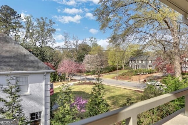 surrounding community featuring a lawn
