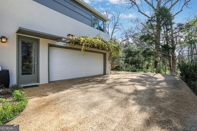 garage with driveway