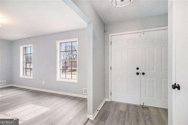 3862 Northstrand Dr, Decatur, GA 30035 - entryway with visible vents, baseboards, and wood finished floors