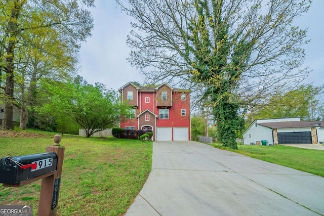 4915 Wycliffe Dr, Stone Mountain, GA 30087 - traditional-style house with driveway, a front yard, and a garage