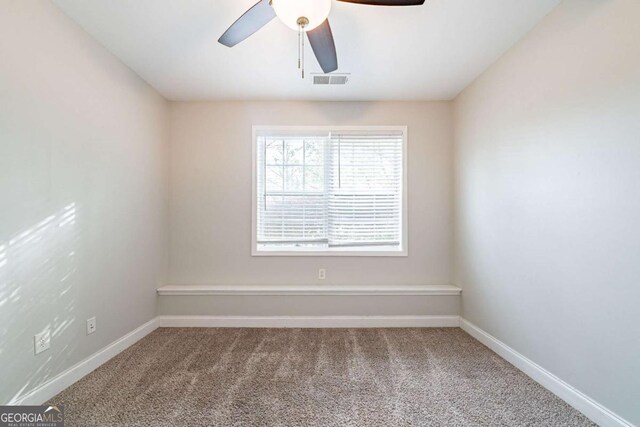 4915 Wycliffe Dr, Stone Mountain, GA 30087 - empty room featuring carpet floors and a ceiling fan