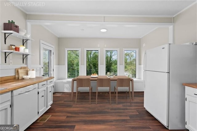 kitchen featuring wooden counters, white cabinetry, white appliances, and dark wood finished floors
