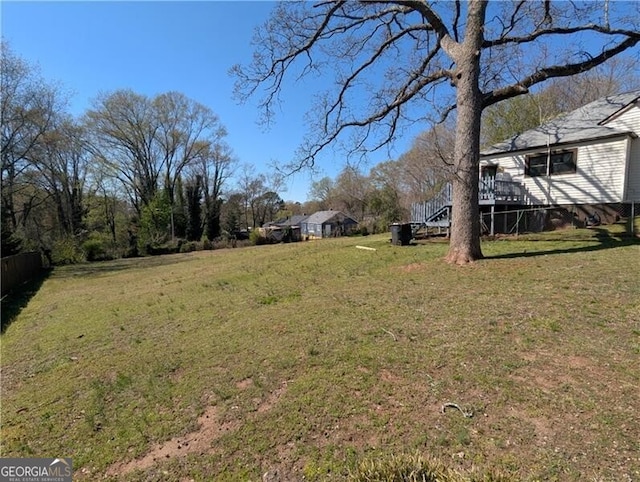 view of yard featuring stairway