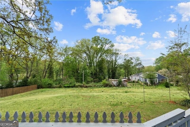 view of yard with fence