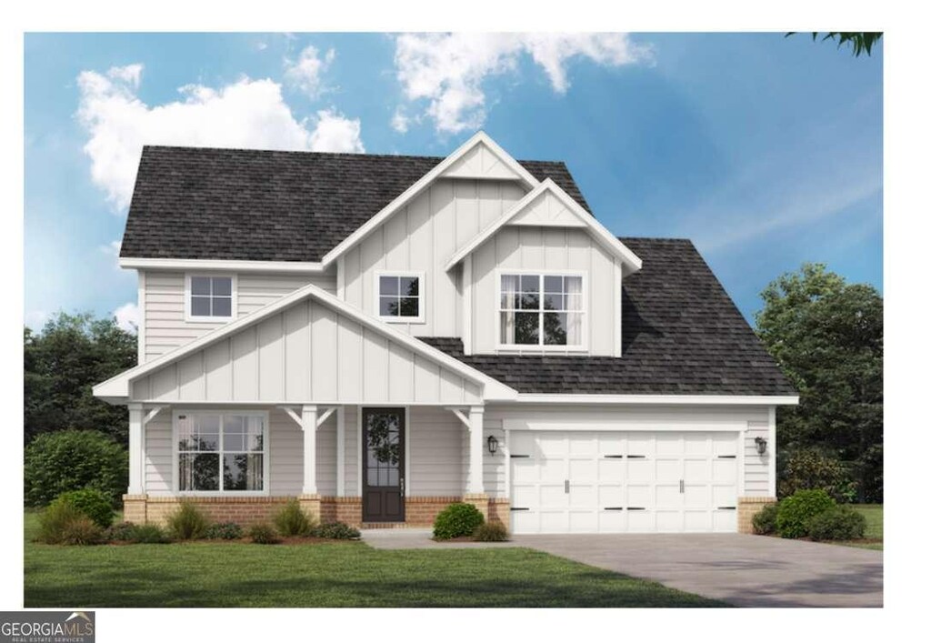 124 Chapman Ridge Rd, Macon, GA 31211 - view of front of house featuring brick siding, board and batten siding, concrete driveway, covered porch, and a shingled roof