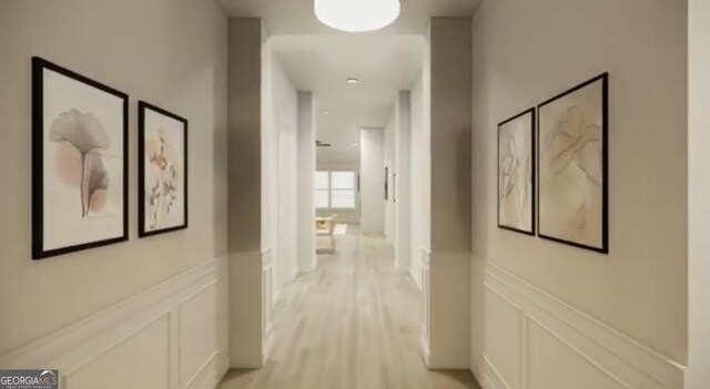 120 Chapman Ridge Rd, Macon, GA 31211 - hallway featuring a decorative wall, light wood-type flooring, and wainscoting