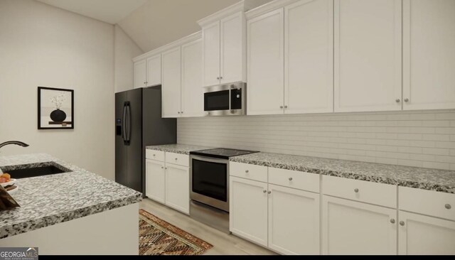 120 Chapman Ridge Rd, Macon, GA 31211 - bedroom with light wood-style flooring, baseboards, and a ceiling fan