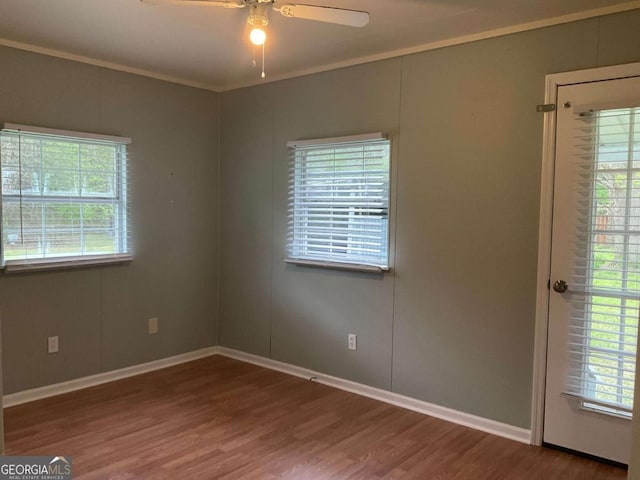 76 Jacqueline Dr, Georgetown, GA 39854 - empty room featuring wood finished floors, ceiling fan, and ornamental molding