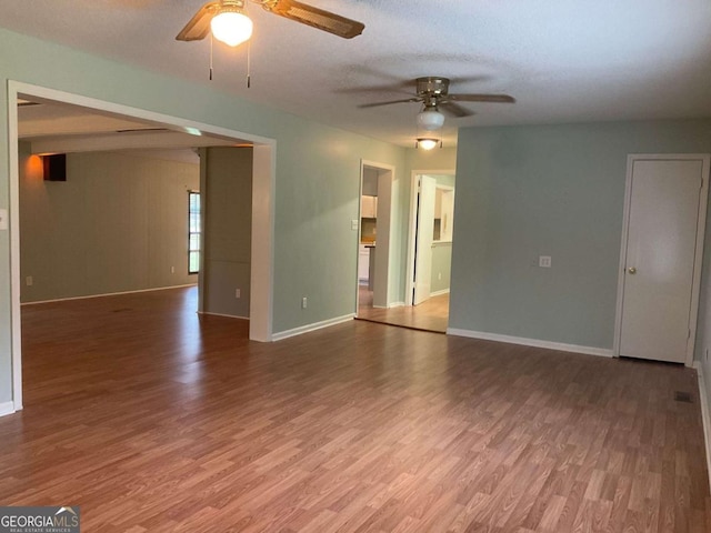 76 Jacqueline Dr, Georgetown, GA 39854 - empty room featuring a ceiling fan and wood finished floors