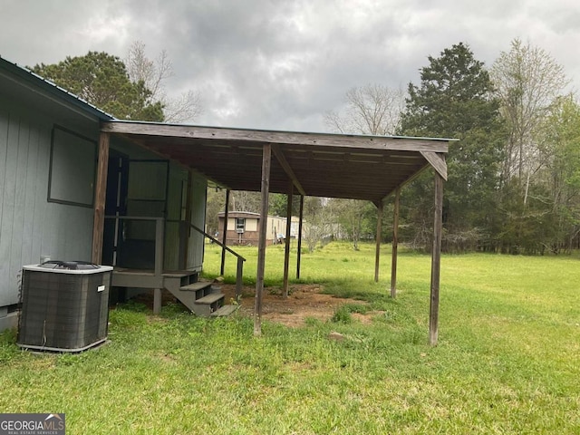 76 Jacqueline Dr, Georgetown, GA 39854 - view of grassy yard with a carport and entry steps