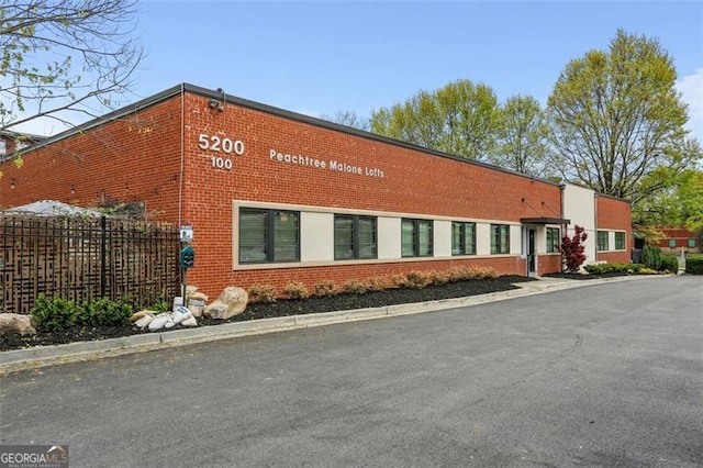 5200 Peachtree Rd Unit 3324, Chamblee, GA 30341 - view of building exterior featuring fence