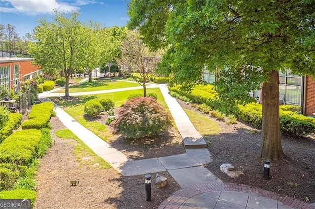 5200 Peachtree Rd Unit 3324, Chamblee, GA 30341 - view of community with a yard