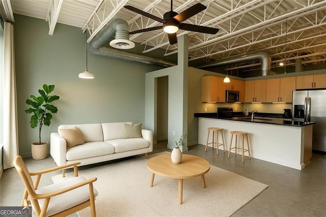 5200 Peachtree Rd Unit 3324, Chamblee, GA 30341 - carpeted living room with a high ceiling, a healthy amount of sunlight, expansive windows, and ceiling fan