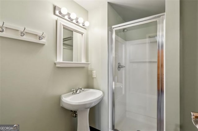 5200 Peachtree Rd Unit 3324, Chamblee, GA 30341 - full bathroom featuring a sink and a shower stall
