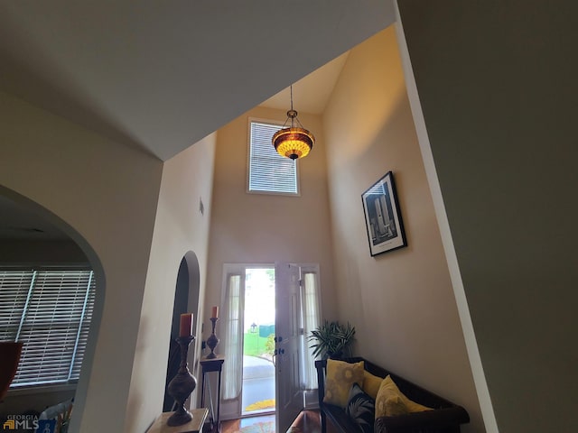 entryway with a high ceiling