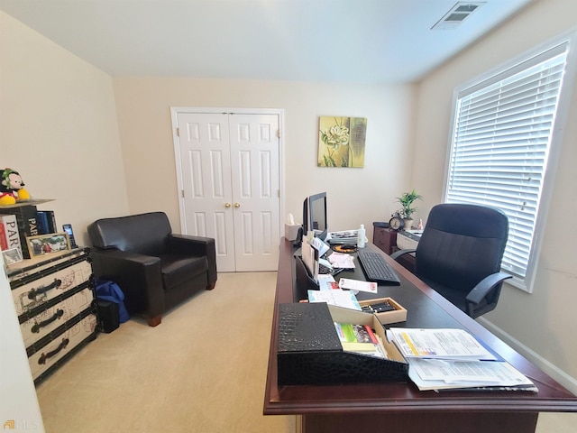 office space featuring carpet flooring and visible vents