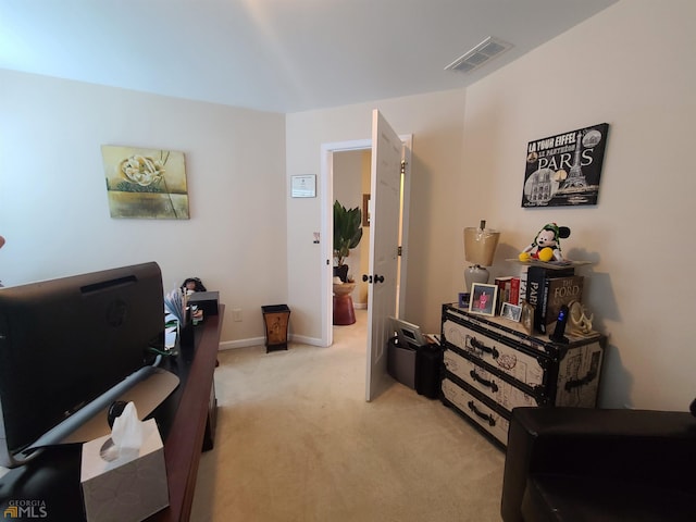 interior space featuring light carpet, baseboards, and visible vents
