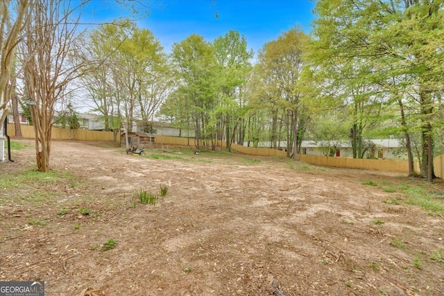 view of yard featuring fence