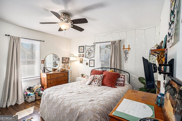 bedroom featuring wood finished floors and ceiling fan