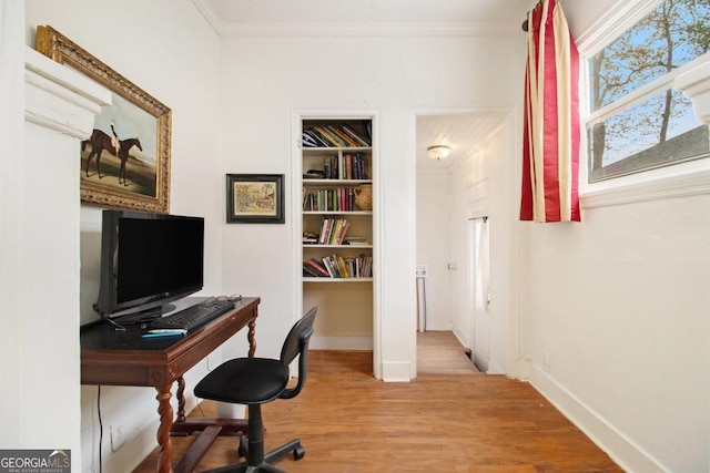 650 Somerset Ter NE, Atlanta, GA 30306 - office featuring wood finished floors, ornamental molding, baseboards, and built in shelves