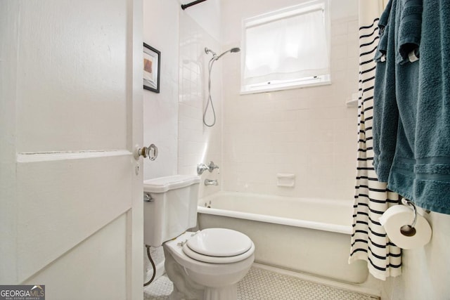650 Somerset Ter NE, Atlanta, GA 30306 - bathroom featuring shower / bathtub combination with curtain and tile patterned flooring