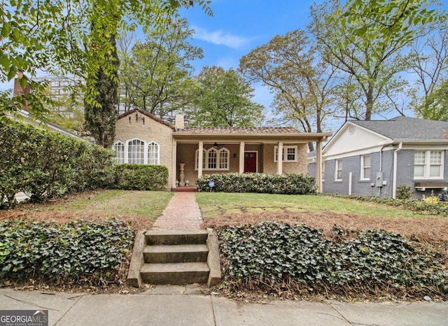 650 Somerset Ter NE, Atlanta, GA 30306 - view of front of home featuring a front yard and covered porch