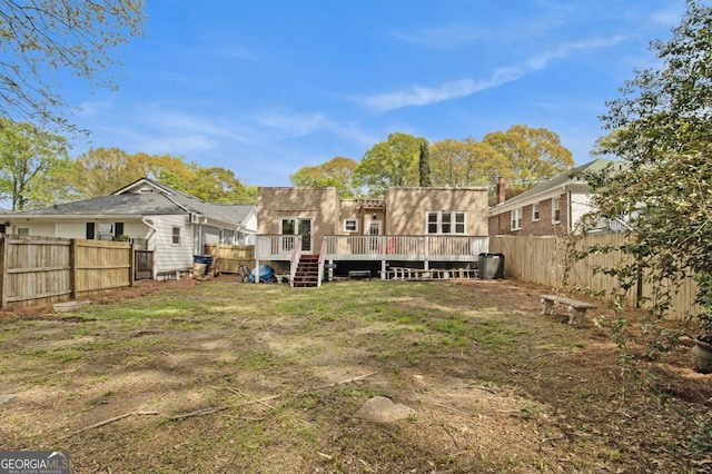 650 Somerset Ter NE, Atlanta, GA 30306 - rear view of house with a yard, a fenced backyard, and a deck