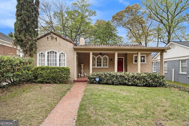 650 Somerset Ter NE, Atlanta, GA 30306 - view of front facade featuring a chimney, stucco siding, and a front lawn