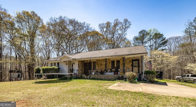310 Austin Rd, Newnan, GA 30263 - ranch-style house with a front lawn and stone siding