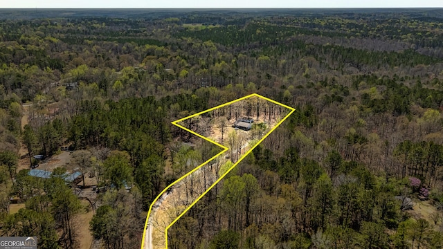 310 Austin Rd, Newnan, GA 30263 - aerial view of property's location featuring a heavily wooded area and property parcel outlined