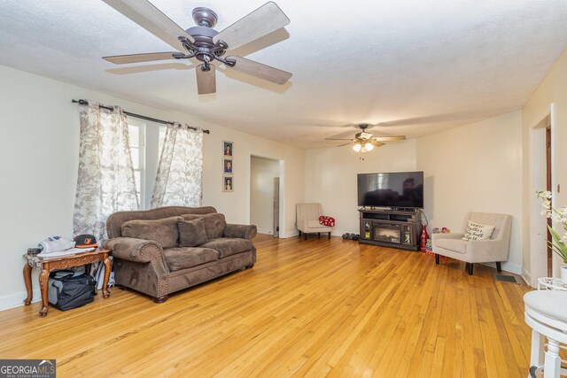 310 Austin Rd, Newnan, GA 30263 - living room with a ceiling fan and wood-type flooring