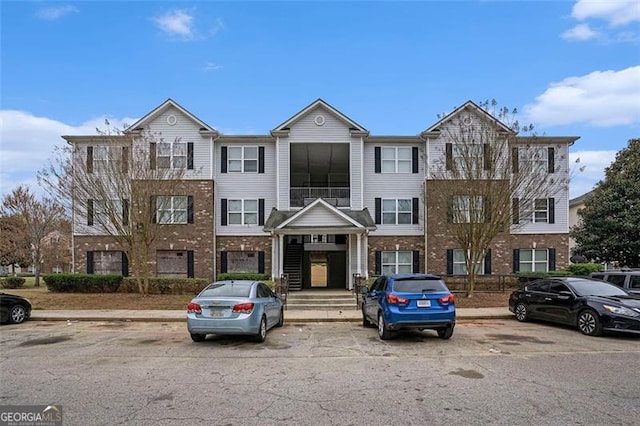 13304 Waldrop Cv, Decatur, GA 30034 - townhome / multi-family property featuring brick siding and uncovered parking