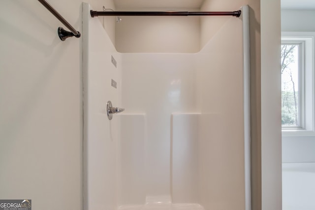 bathroom with a stall shower
