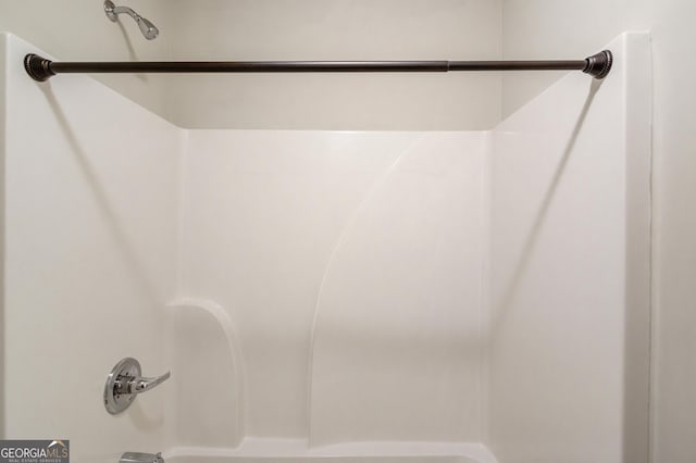 bathroom with shower / bath combination