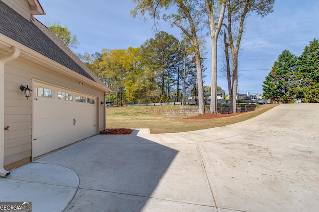 garage with driveway