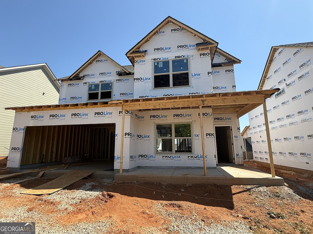 property under construction with an attached garage