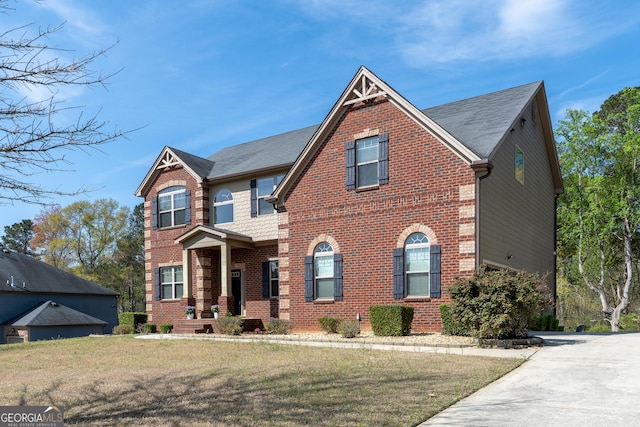 132 Windmeadow Way, Fayetteville, GA 30214 - view of front of property with brick siding and a front lawn
