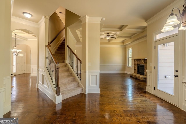 132 Windmeadow Way, Fayetteville, GA 30214 - entryway with coffered ceiling, stairs, a ceiling fan, arched walkways, and ornamental molding