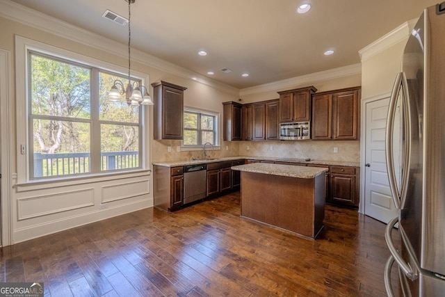 132 Windmeadow Way, Fayetteville, GA 30214 - kitchen featuring a sink, visible vents, tasteful backsplash, and appliances with stainless steel finishes